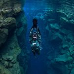 freediver swimming silfra iceland